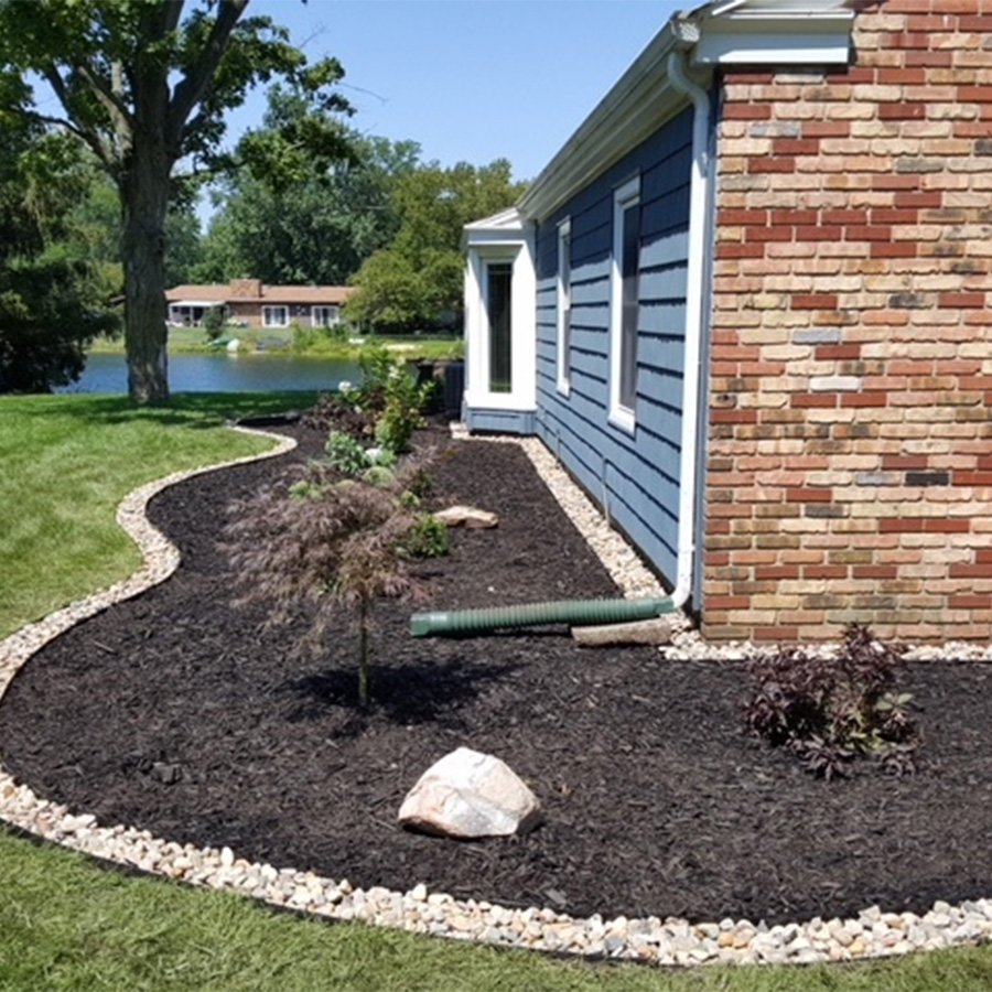 Before and after view of a complete landscape redesign