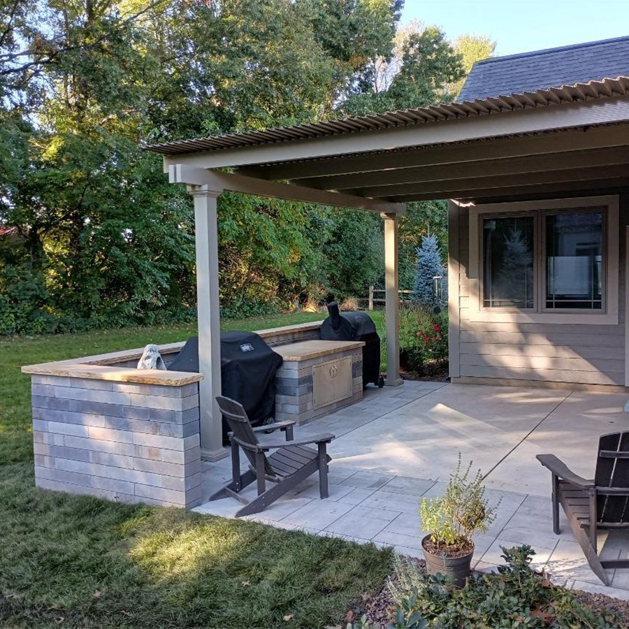 Inviting outdoor living space with comfortable seating and ambient lighting