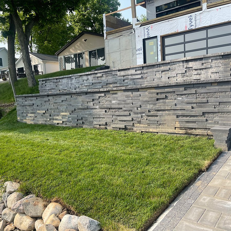 Custom-built retaining wall enhancing outdoor space