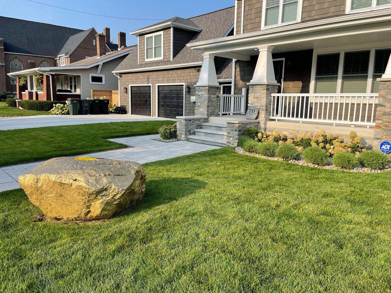 Green lawn in South Bend, IN after overseeding and weed control.